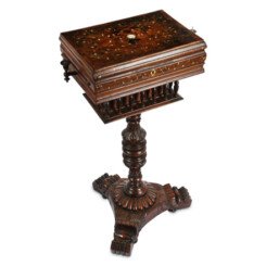 A FINE IVORY AND BONE-INLAID STATIONARY SECRETAIRE A FINE IVORY AND BONE-INLAID STATIONARY SECRETAIRE