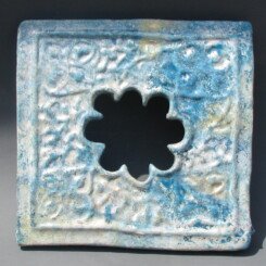 A Glazed Blue Riqqa tile