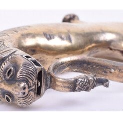 Probably Mysore , single edge blade cut with 3 narrow fullers, silver gilt hilt with lion’s head pommel and quillon terminals, knuckle bow with Makara head finial