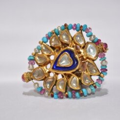 A gemstone diamond and pearl ring with enamel. A gemstone diamond and pearl ring with enamel.