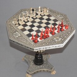 A Ivory and wooden Miniature Chest set