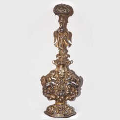 On raised foot, the drop-shaped body rising to a waisted and ringed neck and elongated stem worked in the form of an angel