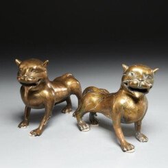 Pair of Brass Mughal Lions with stripes on the body , natural patina, 19th century.