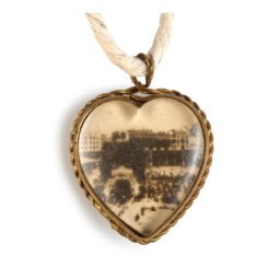 Holding two old photographs of Mecca and Medina. 1930, India. Size 3 cm Mecca and Madina Circa